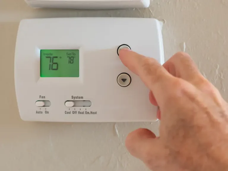 hand pressing thermostat